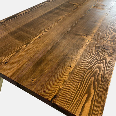 In the world of furniture what does reclaimed actually mean?