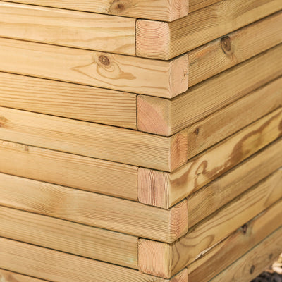 A close-up corner view of a rectangular wooden garden planter filled with yellow flowers and green plants. The durable timber planter has a modern, sleek design and is placed in a garden.
