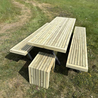 Wooden garden dining set with full-length benches and steel X legs, ideal for large outdoor gatherings and patios.