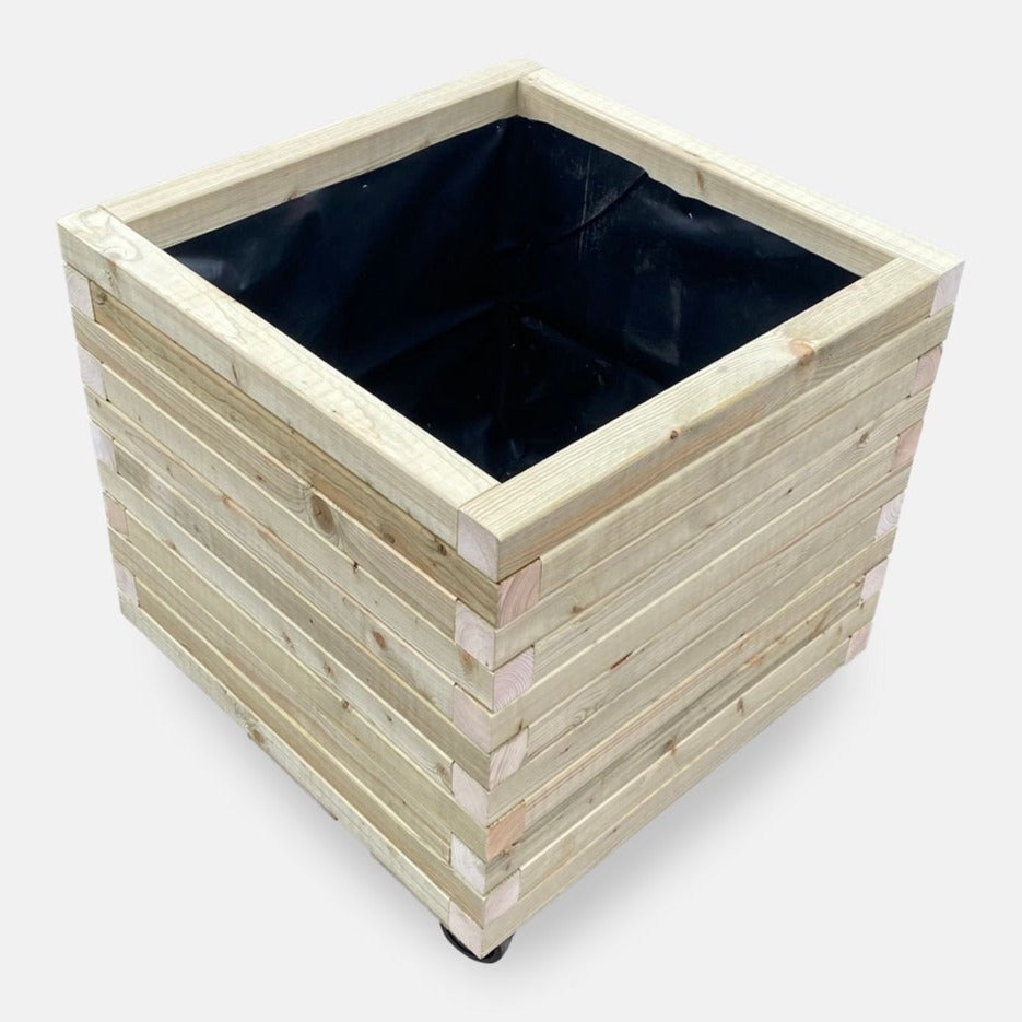 Large square wooden planter in a natural finish with a modern, sleek design. Fitted castors/wheels are shown on this square mobile planter. Made from durable sustainable timber.
